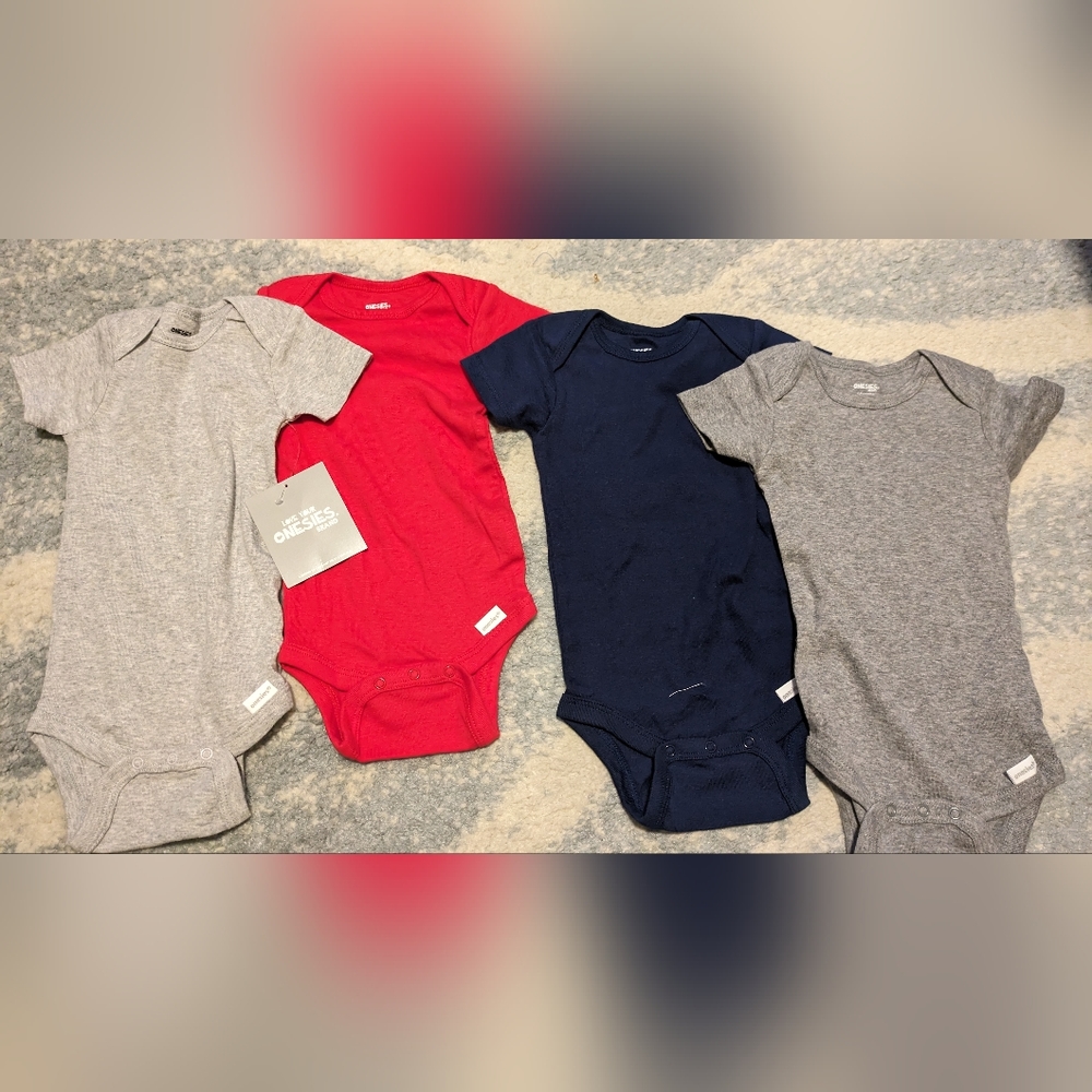 Bundle of 4 brand new 3-6 mo onesies